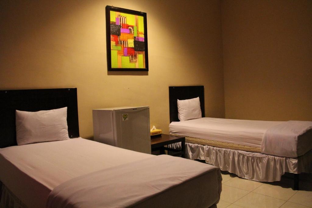 Hotel Sing A Song Pematangsiantar Bilik gambar