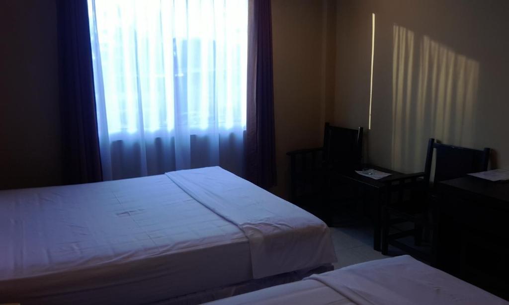 Hotel Sing A Song Pematangsiantar Bilik gambar